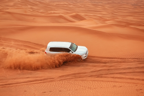 Private Desert Safari with Sand Boarding, Dune Bashing Half Day Desert Safari Tour with Camel Ride