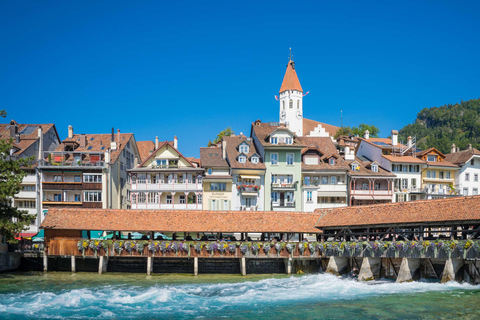 Vanuit Zürich: Thun-tour, Beatusgrotten, boottocht op het meer en kaas
