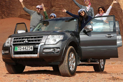 overnight: sleep under the stars in the cave in Wadi Rum Protected Area Caml tour