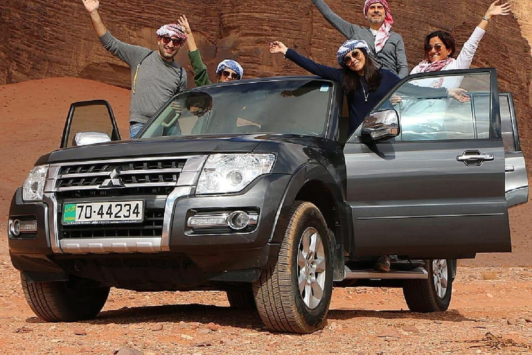 overnight: sleep under the stars in the cave in Wadi Rum Protected Area Caml tour