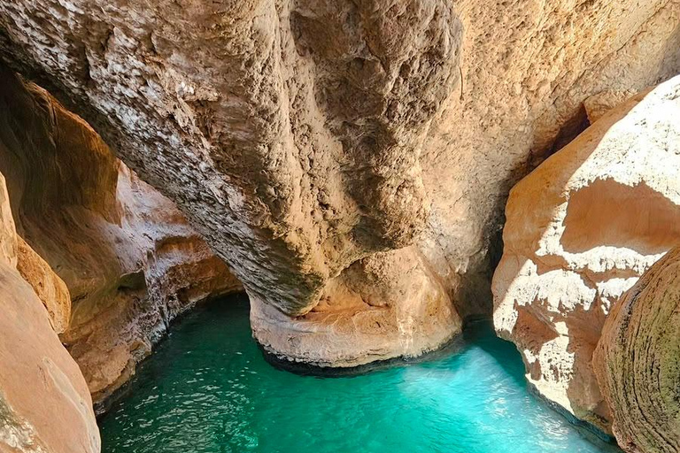 From Muscat: Private Wadi Shab & Bamah Sinkhole Day Trip Wadi Shab Adventure & Bamah Sinkhole –Oman’s Natural Wonders
