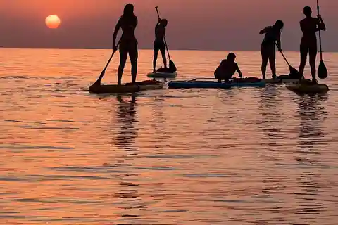 Pagaia al tramonto e Sup Yoga