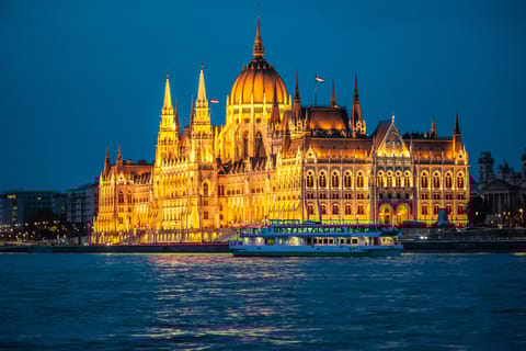 Budapest night sightseeing cruise with illuminated Parliament Building
