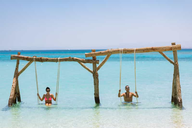 Hurghada: Sunset Hula Hula Island W/ Snorkeling & WaterSport | GetYourGuide