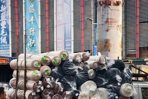 Guangzhou: Textile Hub and Garment Factory Half-day Tour