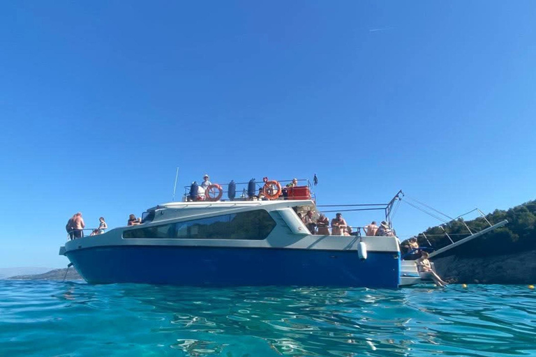 From Lefkimmi: Blue Lagoon Sunset Glass-Bottom Boat Cruise