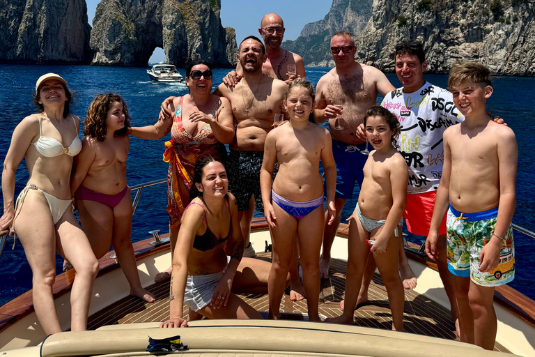 Capri Boat Tour with Caves, Swimming, Aperitif and Champagne From Capri: PRIVATE Capri Boat Tour