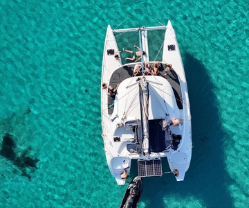 Au départ d'Ornos : Croisière en catamaran Mykonos Delos avec repas et SUP