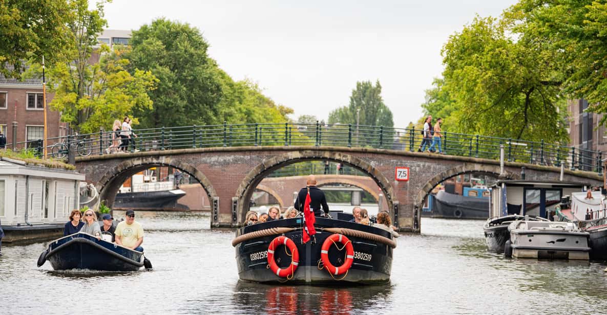 Afbeelding 15 van Amsterdam: begeleide open boottocht met onbeperkt drankjes