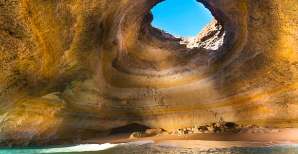 Best Benagil Cave Boat Tours (2026): Ranked, Prices & How to Book Speedboat entering the Algar de Benagil sea cave on a tour from Portimão