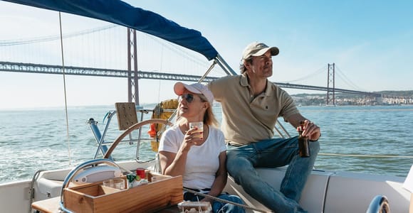 Lisbon: City Skyline Sailboat Cruise with Drink and Snacks