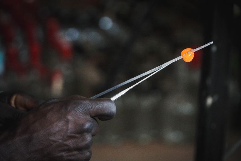 Kampala: Glassblowing, Beadmaking, and More Art Experience Blowing Glass Bubbles