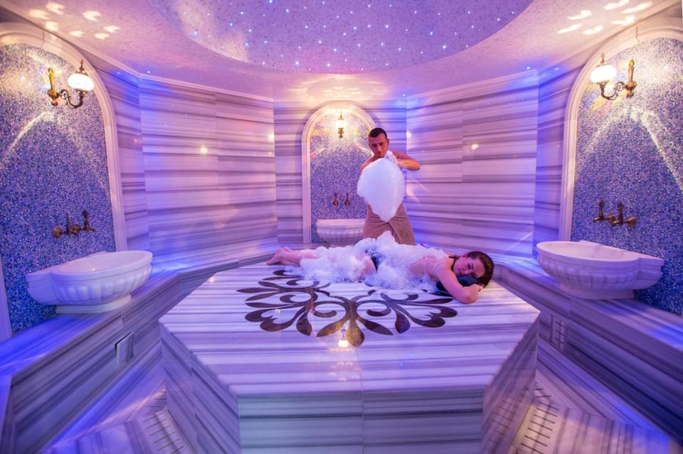 A marble wash basin inside a traditional Turkish hammam