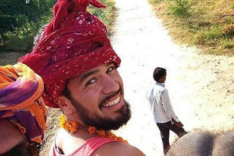 Jaipur: Hathigao Elephant Village Ride, Feeding, & Photos Riding, Feeding, Climbing And Photography with Elephant