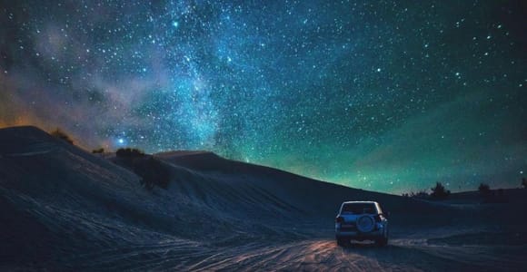 Doha: Night Desert Safari with Camel Ride and Sandboarding