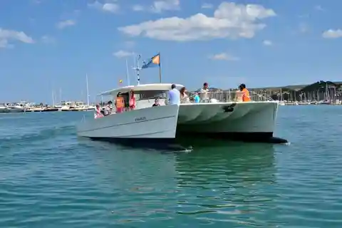 Dénia: Sunset Cruise on a Motor Catamaran