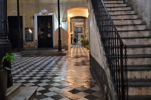 Buenos Aires: tango in an old tenement house + glass of wine.