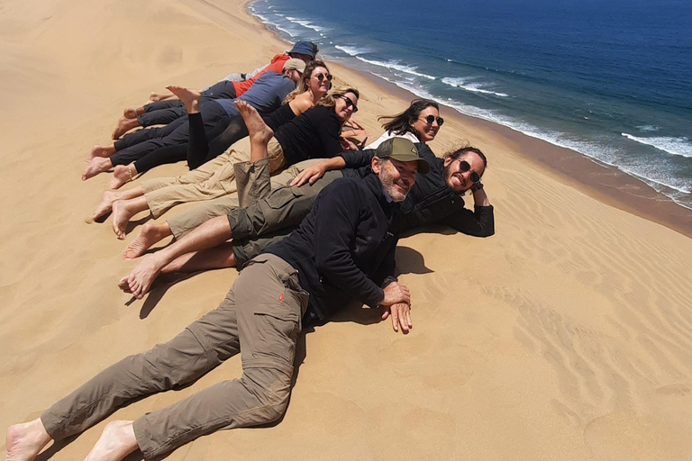 Small Group Sandwich Harbour 4x4 tour where dunes meet ocean