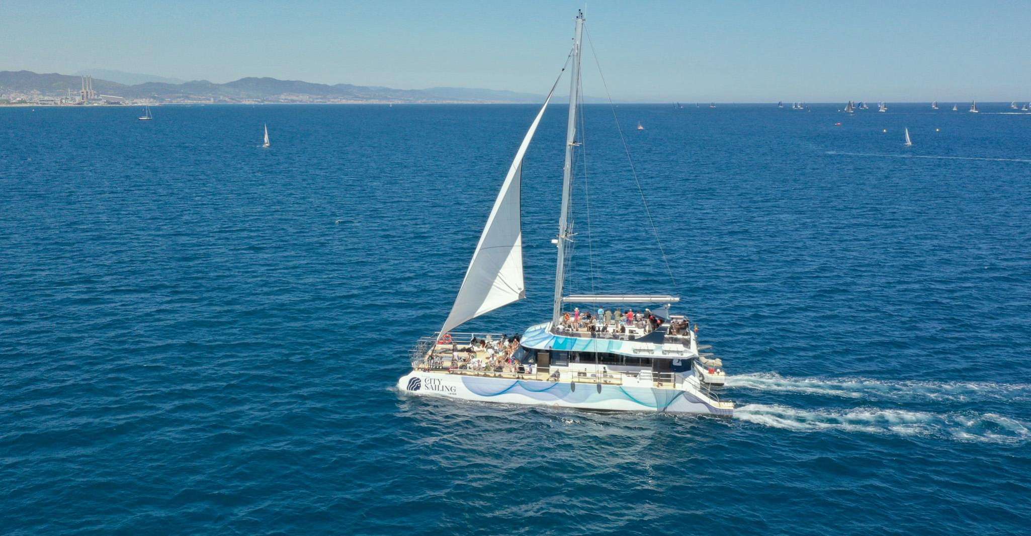 Barcelona: Daytime or Sunset Catamaran Cruise with Music photo 5