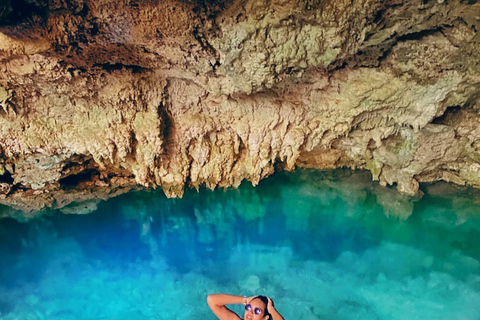 Zanzibar: laguna blu, ristorante sulla roccia, grotta e spiaggia