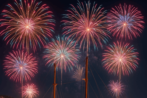 Atlantic Festival Funchal: Fireworks view from a wooden boat with a drink Atlantic Festival Funchal: Firework view from a wooden boat with a drink