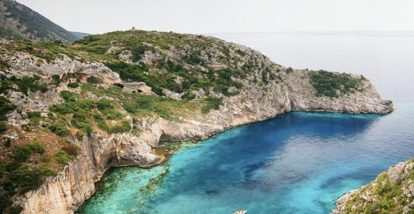 From Tirana/Durrës: Sazan Island & Grama Bay Speedboat Tour
