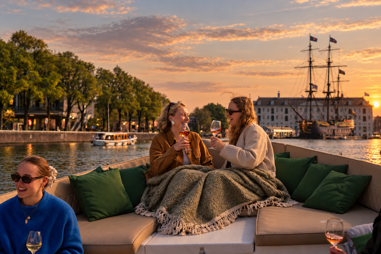 Amsterdam: Sunset & Evening Canal Cruise with Bar on Board Evening Cruise in Open Boat from Central Station