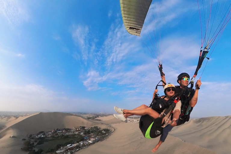 Paraglide over the desert and the Huacachina oasis