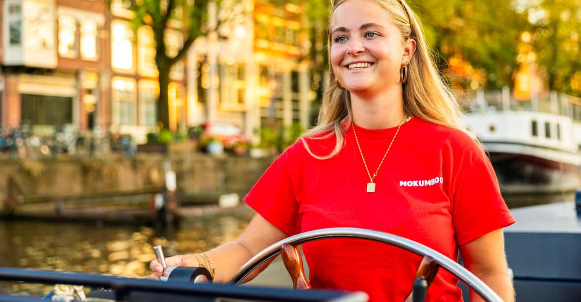 Afbeelding 9 van Amsterdam: begeleide open boottocht met onbeperkt drankjes