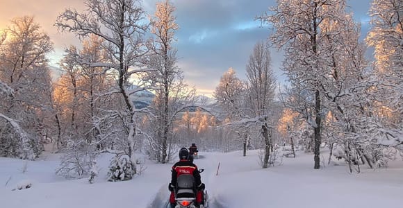 From Tromso: Electric Snowmobile Safari in the Lyngen Alps
