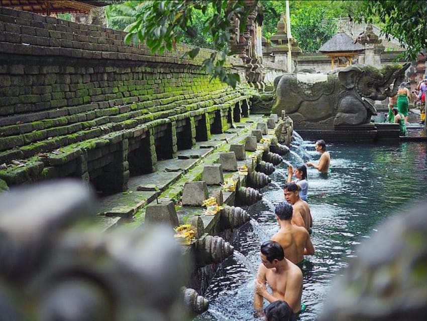 Ubud Purification Temple Waterfalls And Swing Private Tour Getyourguide