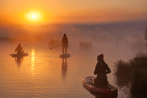 From Riga: Sunrise SUP Tour with Pick-Up at Cenas Tīrelis