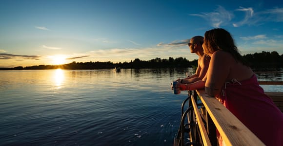 Rovaniemi: Half-Day or Evening on a Floating Sauna, Swimming and BBQ
