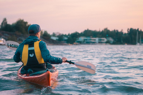 Urban sunset kayaking tour in Helsinki