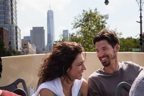 Hop on hop off NYC bus stop and skyline