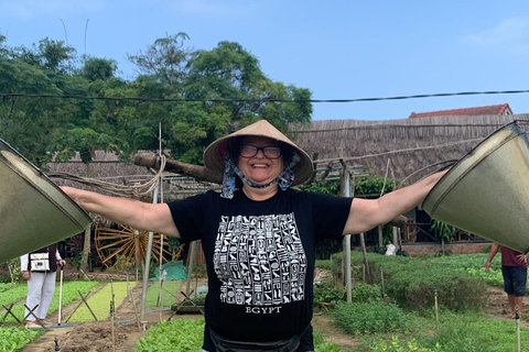 Farming with Farmers at ancient vegetable Village "Tra Que"