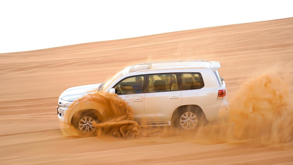 Dubai: Jeep Desert Safari, Camel Ride, and Quad Bike Tour