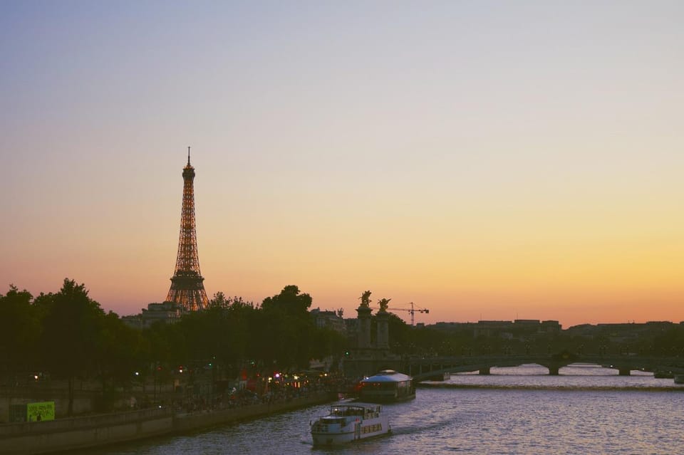 Paris Rive Rouche Paris: Evening City Highlights Walking Tour and River Cruise | GetYourGuide