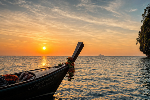 From Phi Phi: Iconic Bays by Longtail—Beach, Lagoon, Snorkel Phi Phi: Longtail Join Trip — Bays, Beach & Snorkeling