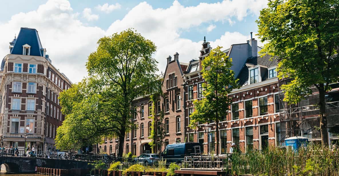 Afbeelding 12 van Amsterdam: Grachtenrondvaart in open boot met drankoptie
