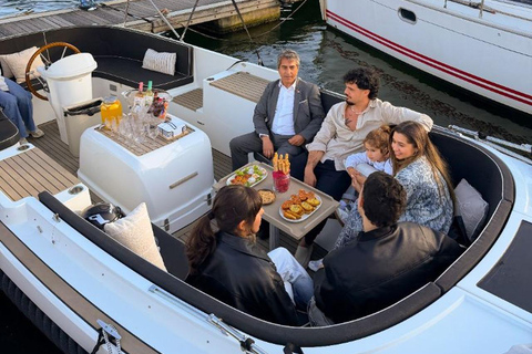 Lisbon Sunset Luxury Boat Vibes with Drinks & Pizza Lisbon Luxury Cozy Cruise with Drinks & Pizza