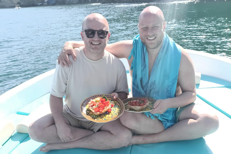 Naples: Posillipo Coast Snorkeling Cruise with Food & Drinks