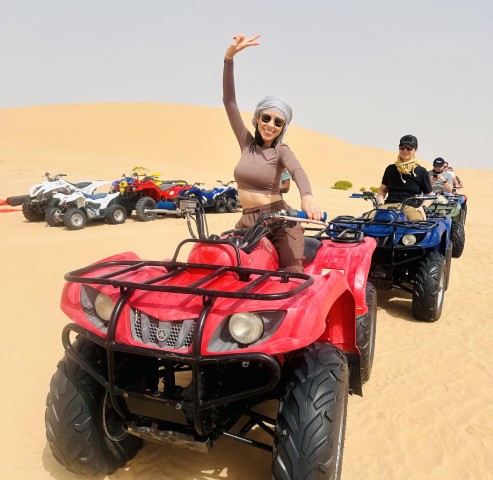 Visit Abu Dhabi Desert Safari, Camel Ride, Quad Bike & BBQ Dinner in Abu Dhabi
