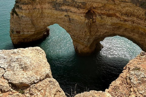 From Faro: Guided Caves, Beaches, Swimming & Hiking Day Tour