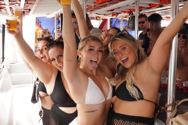 Visit Miami Booze Cruise Boat Party with DJ, Snacks, & Open Bar in Miami