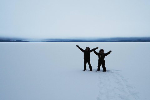 Snowshoe experience with traditional beverages in Lapland