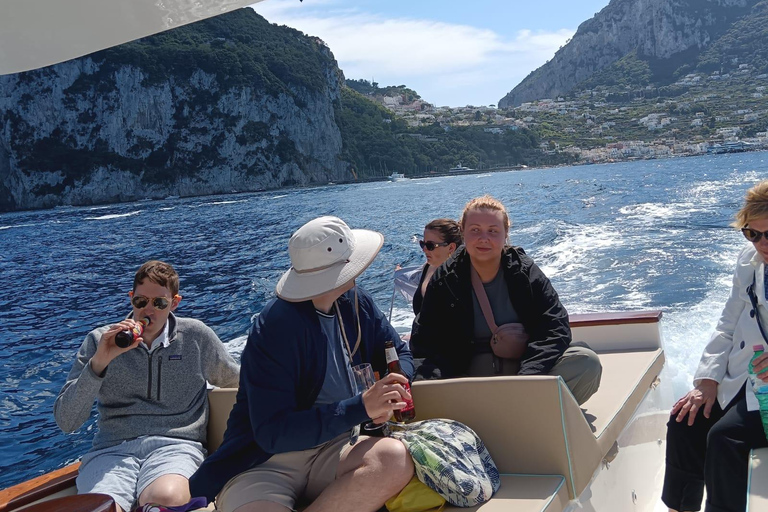 Private Amalfi Coast Boat Tour by boat with Aperitif & snack Private Amalfi Coast Boat Tour by Gozzo with Skipper & Drink