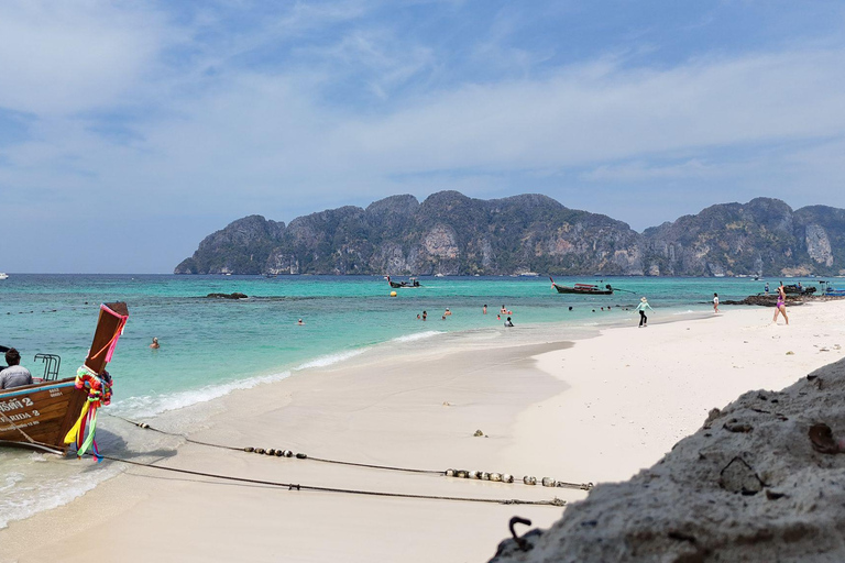 Phi Phi: 7 Islands longtail boat with Sunset and Plankton