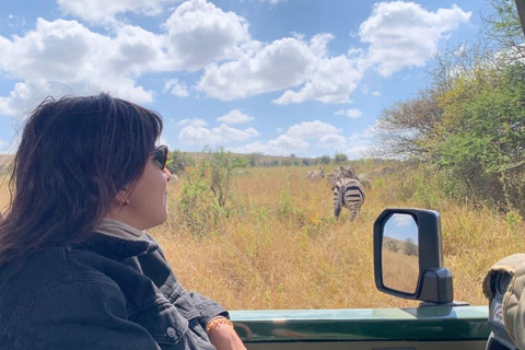 Maasai Mara Day Game Trip in Open Sided 4x4 Safari Jeep