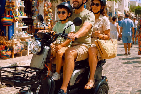 Djerba in Electric Mode: 3 Wheels, 3 Adventurers, Ready to Explore the Island? Djerba: Electric 3-Wheeler Ride for a Fun Family Experience